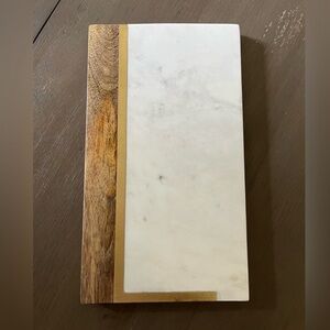 Crate&Barrel L initial cutting board 

Original price $50